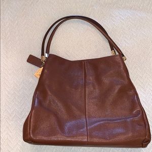 COACH brown leather short strap shoulder bag.